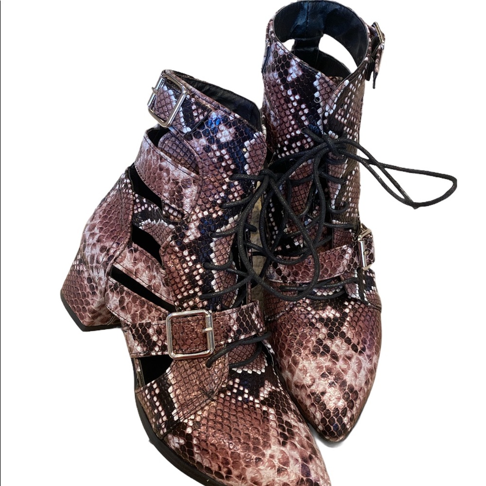 Cut out snakeskin ankle booties